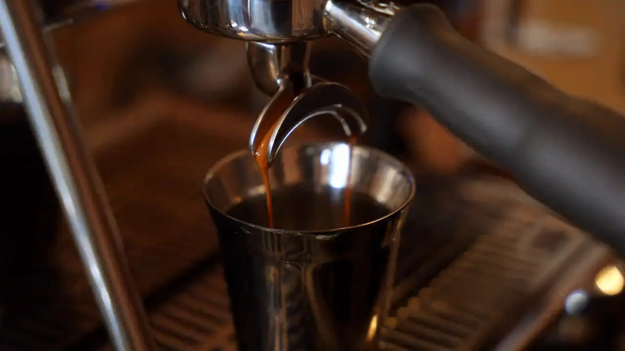 An espresso shot pours from the La Marzocco GS3